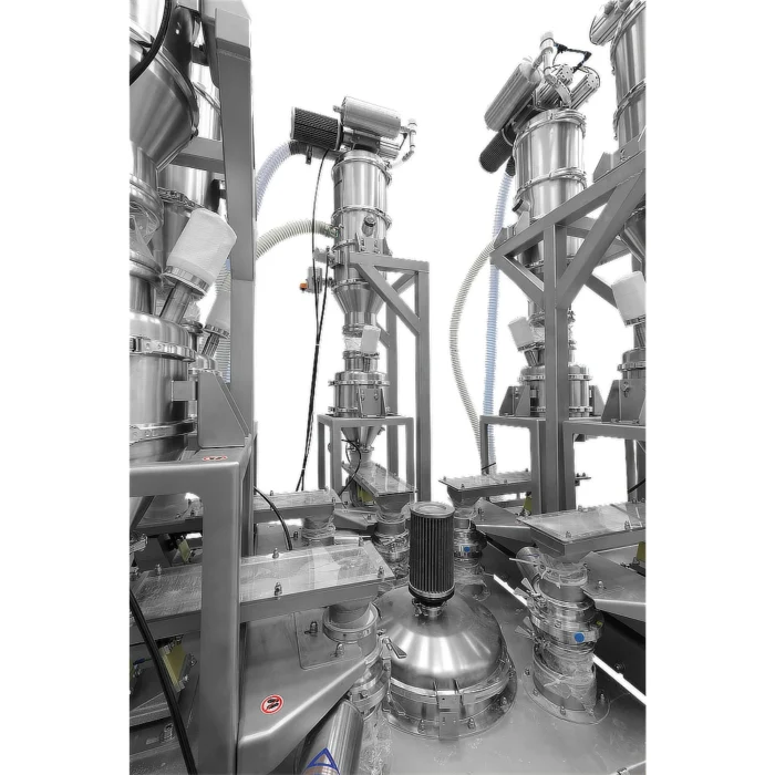 Tour de transport et de dosage : alimentation de la poudre par transport sous vide. Tamponnage et dosage au poids près de la poudre dans la station suivante.